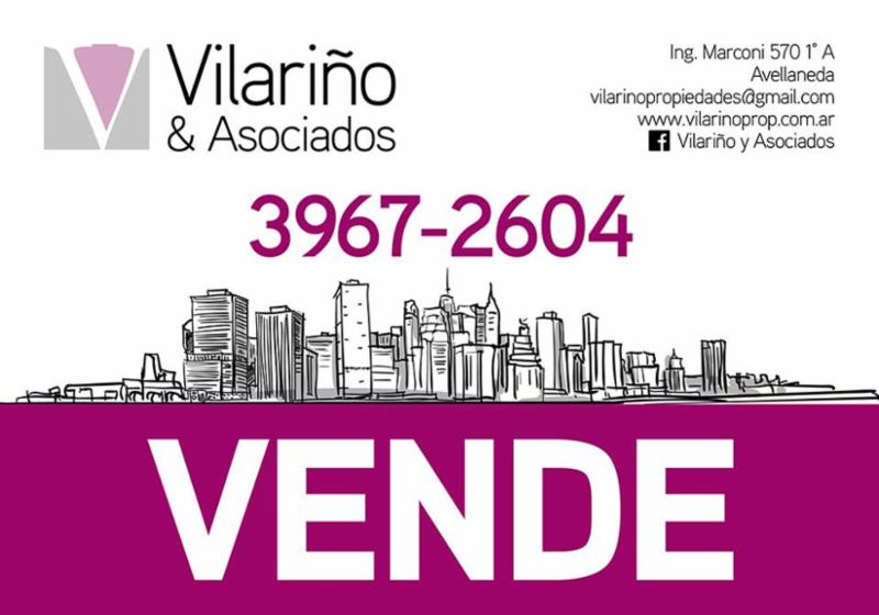 Vilariño y Asociados logo