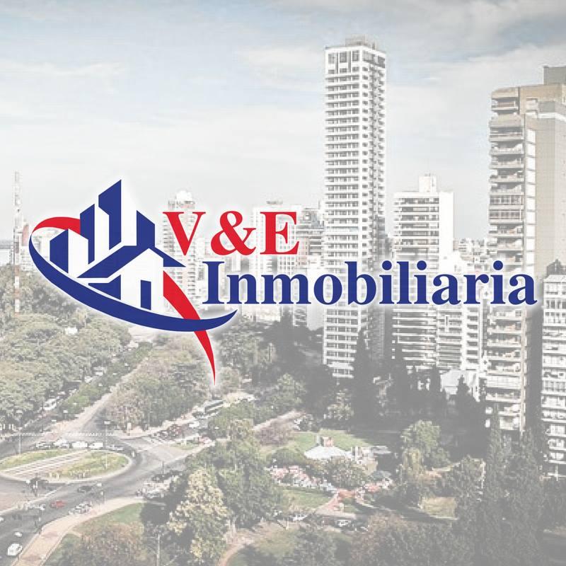 V&E INMOBILIARIA logo