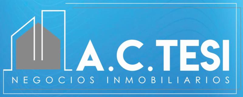 A. C. TESI NEGOCIOS INMOBILIARIOS logo