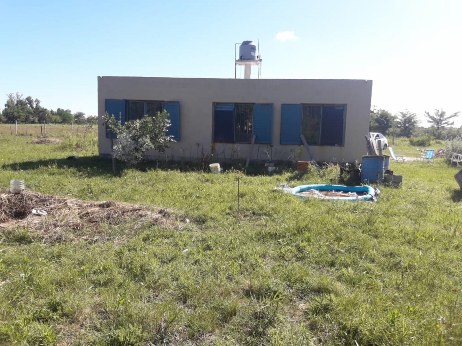 CASA CON 3 DORMITORIOS, 2 BAÑOS SOBRE LOTE DE 4000 m2