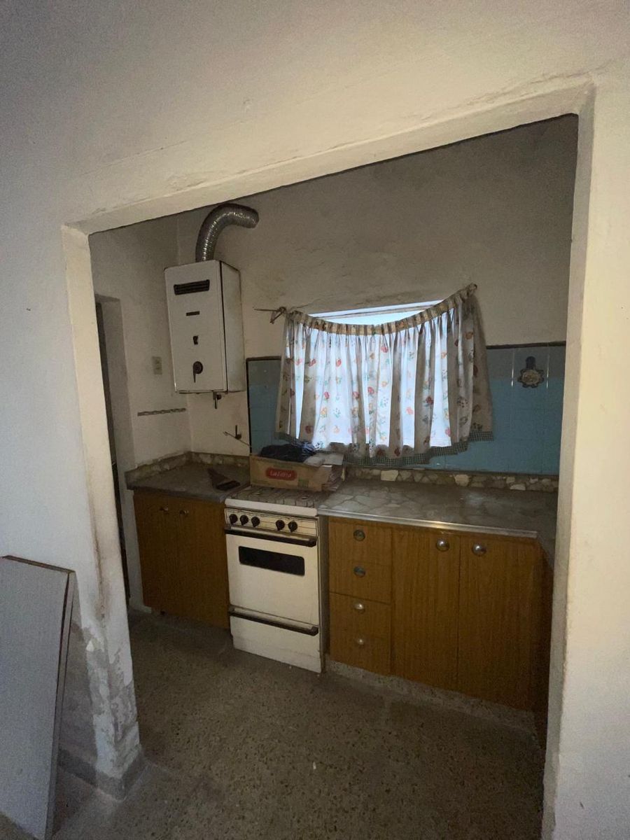 VENTA CASA AL FRENTE DOS AMBIENTES CON GARAJE Y PH AL FONDO DOS AMBIENTES CON PATIO Y ENTRADA INDEPENDIENTE. LA TABLADA