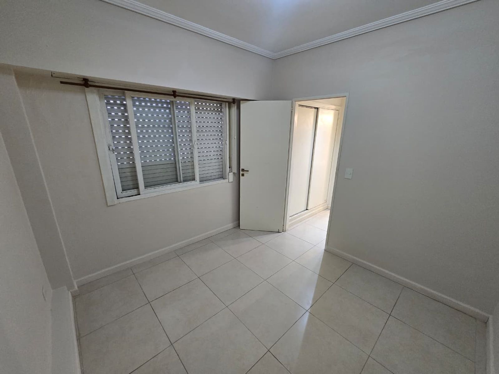VENTA DE DEPARTAMENTO 2 AMBIENTES CON COCHERA - APTO CRÉDITO HIPOTECARIO
