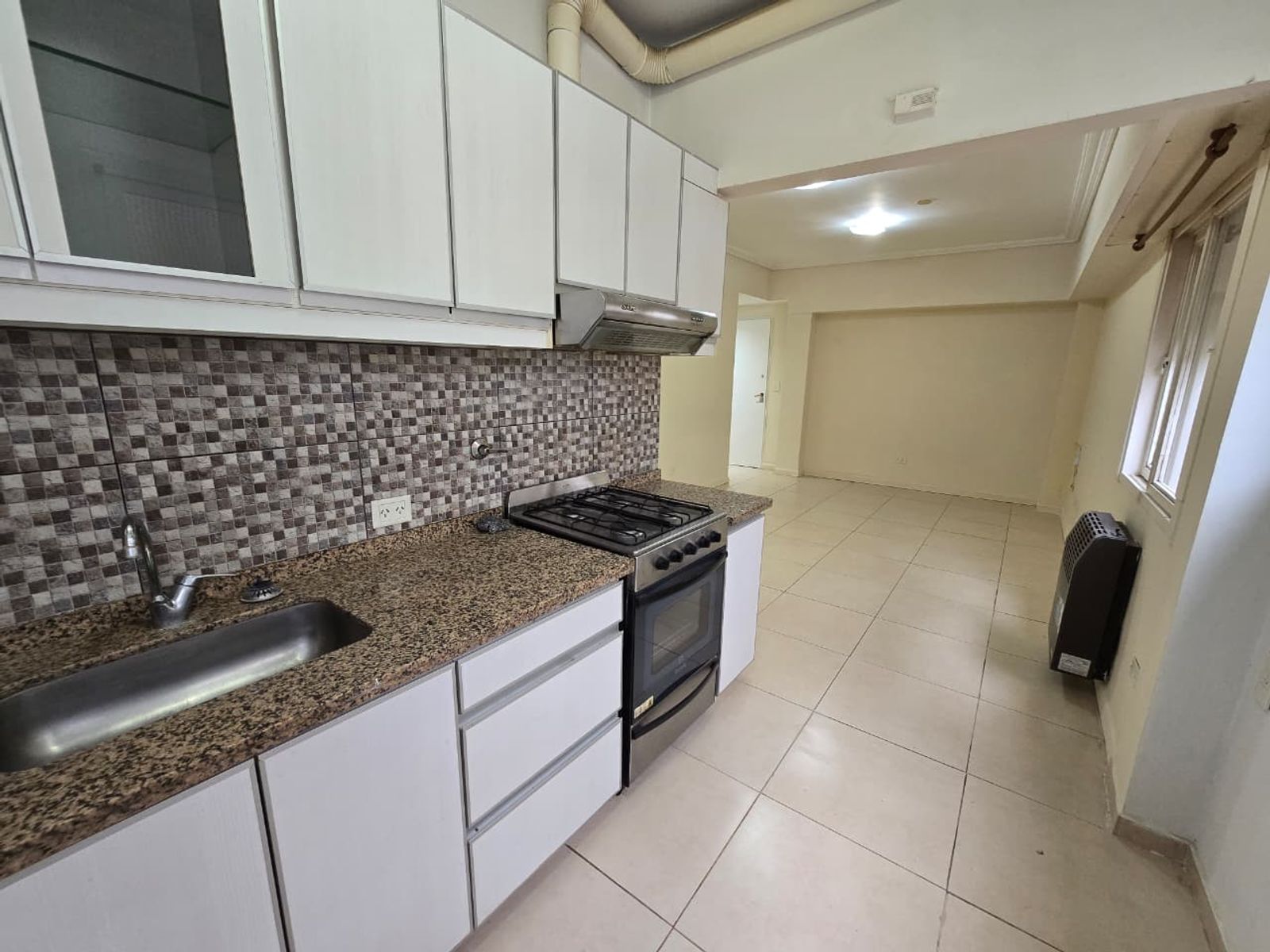 VENTA DE DEPARTAMENTO 2 AMBIENTES CON COCHERA - APTO CRÉDITO HIPOTECARIO