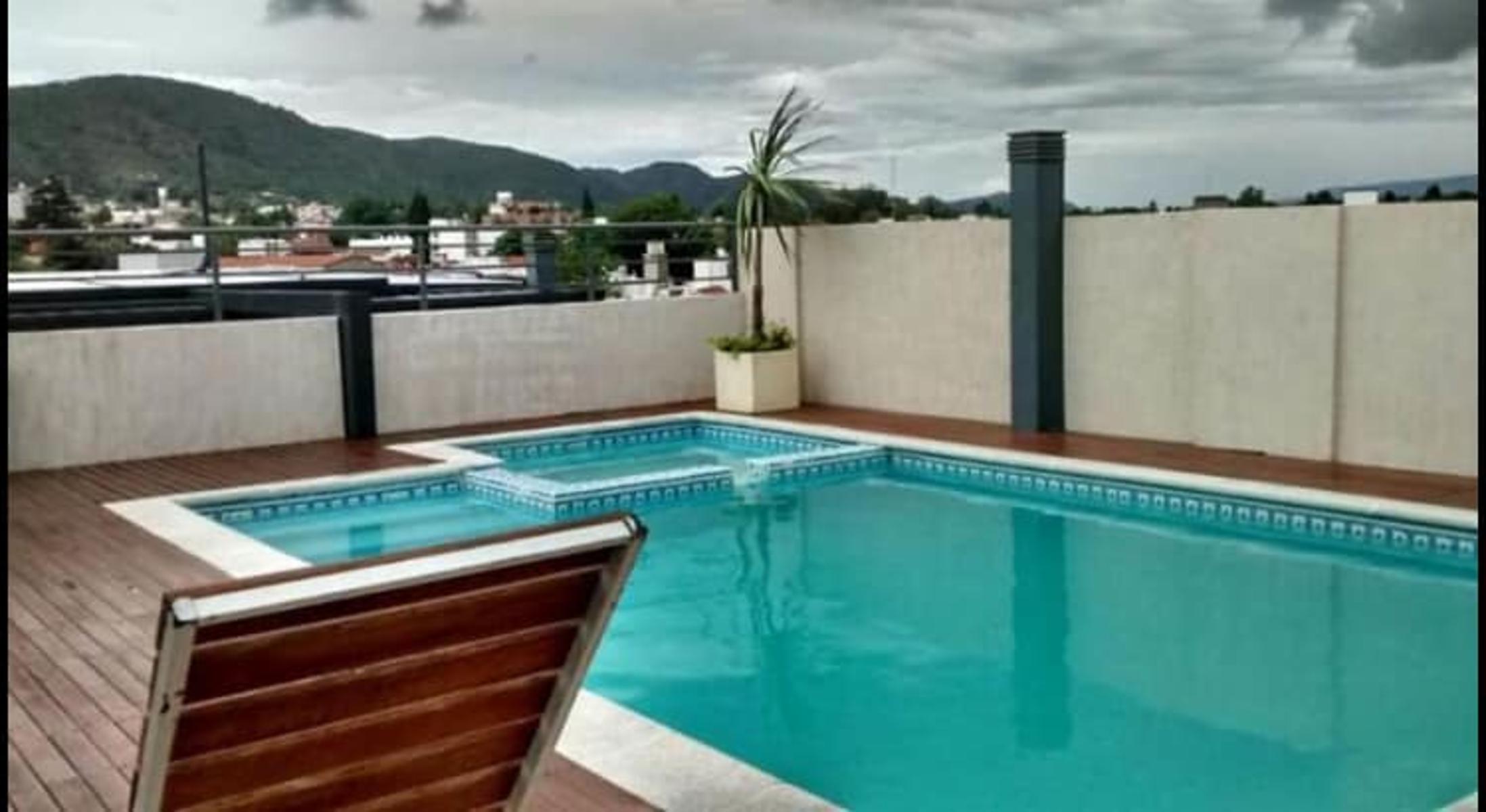 VENDO O PERMUTO DEPARTAMENTO DOS DORMITORIOS Y COCHERA EN EDIFICIO MIRALEJOS
