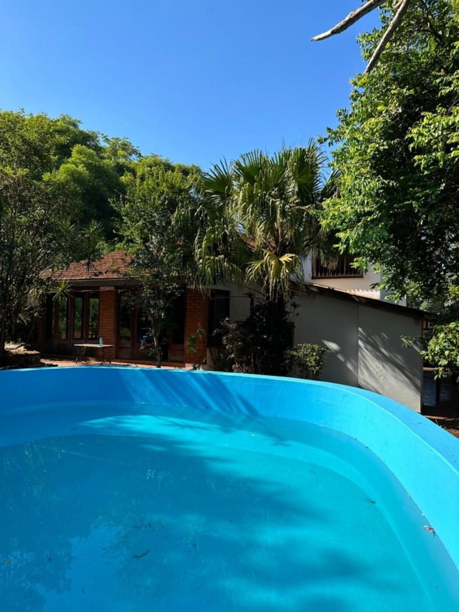 HERMOSA CASA ESTILO CHALET DE 3 DORMITORIOS, GRAN TERRENO EN POSADAS MISIONES